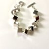 Pulsera cubos.